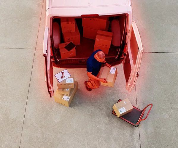 Delivery man and truck highlighted red