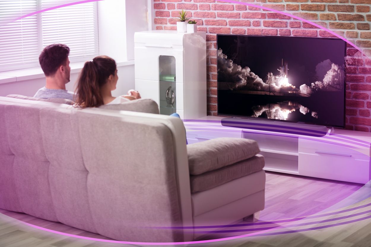 Couple on the couch watching TV