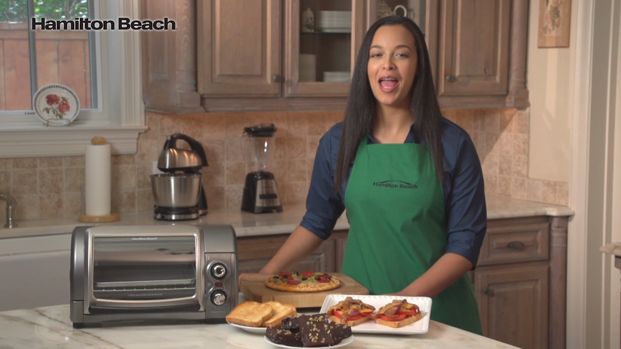 thumbnail video image 3 of Hamilton Beach 4 Slice Countertop Toaster Oven with Easy Reach Roll-Top Door, Bake, Broil & Toast Functions, Silver, 3 of 10